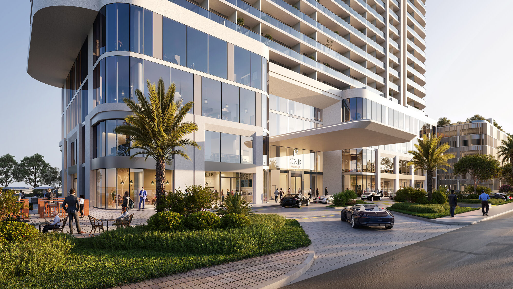 Entrée des résidences et lobby ONE PENINSULA Batumi by HOLM Developments — street-level entrance, glazed lobby and landscaped gardens of the residences